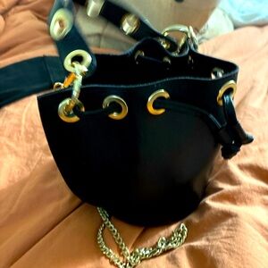 House of Harlow bucket bag
This bag  NWOT in my closet you know how it is